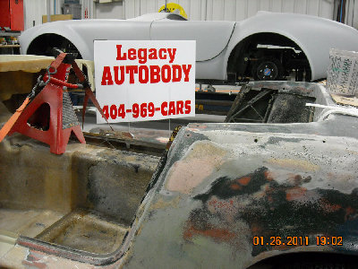 Body with Legacy sign.jpg and 